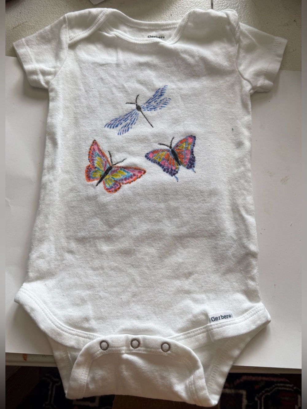 Hand Crafted White Baby Onesie 
Butterfly / dragonfly